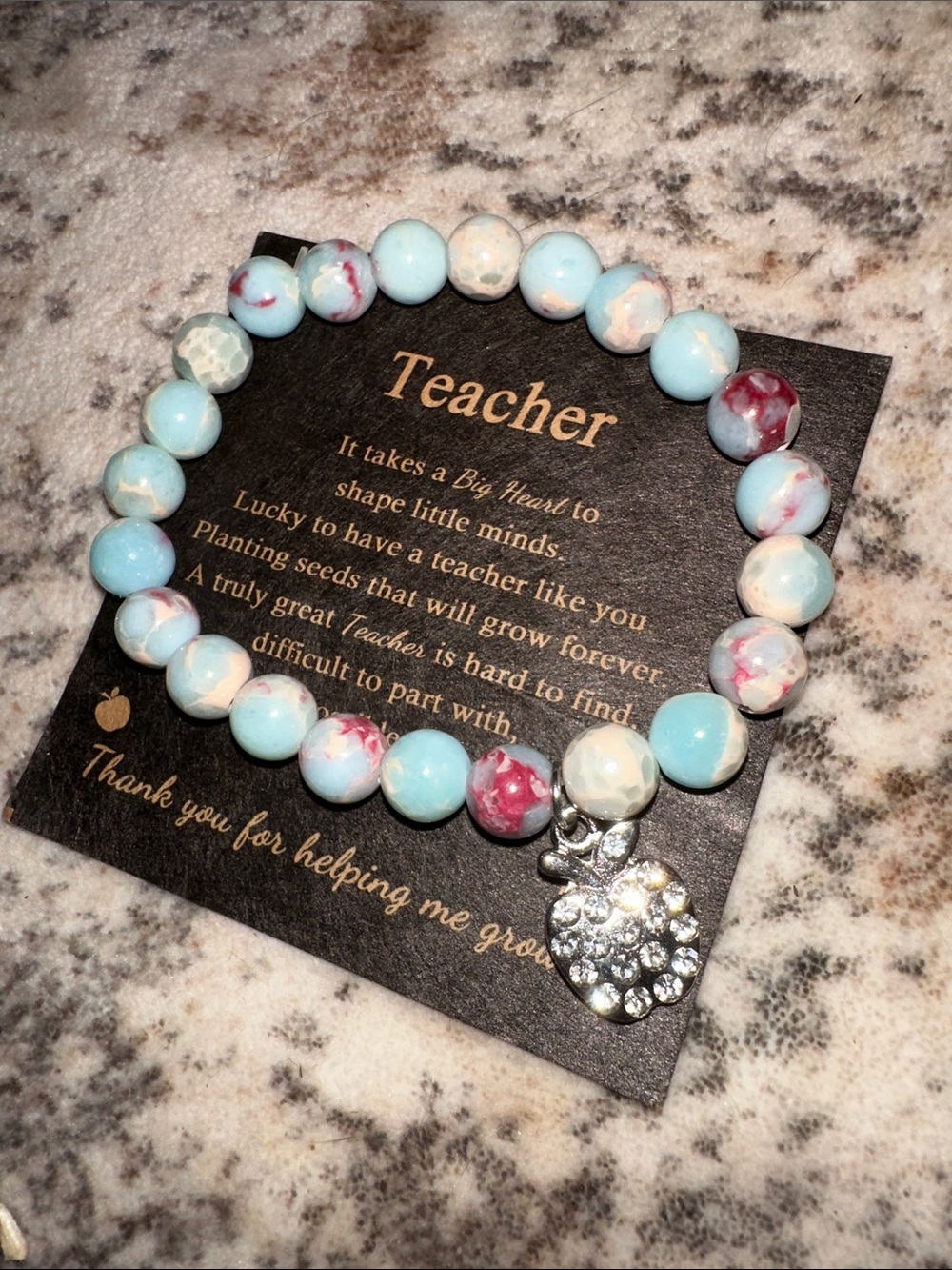 Beaded Teacher Appreciation Bracelet in a Light Blue Marble with Apple Charm